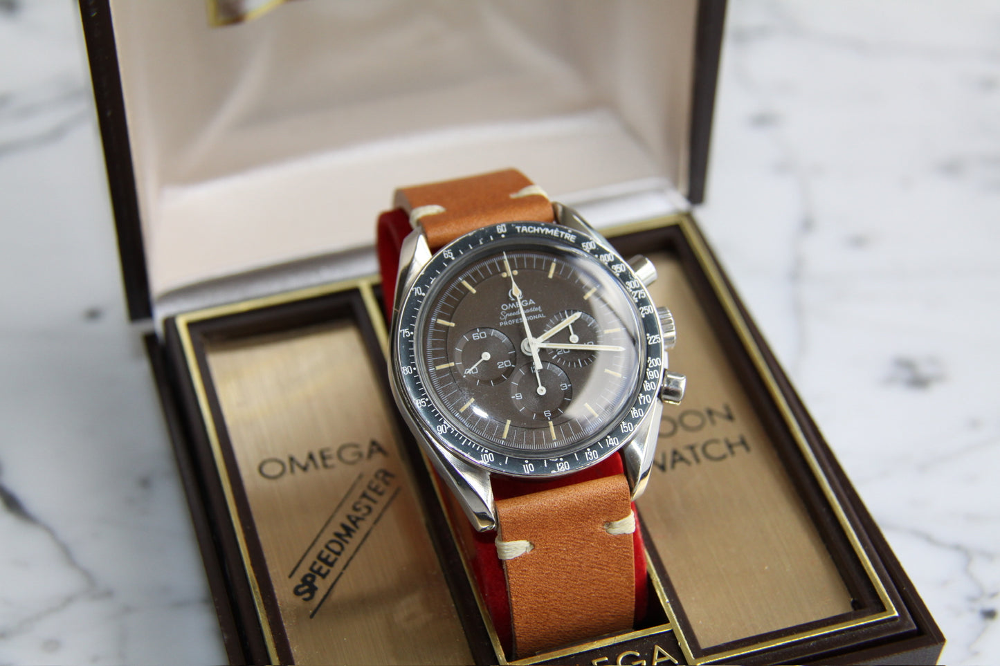 Omega Speedmaster Professional Moonwatch Tropical Brown Dial Heavy Patina Blue Insert 1969 (Box/Serviced)