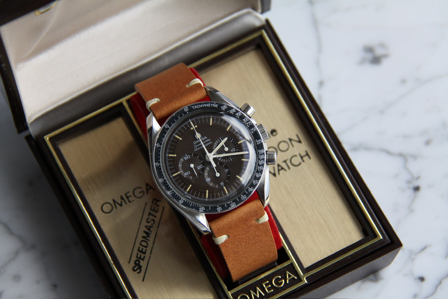 Omega Speedmaster Professional Moonwatch Tropical Brown Dial Heavy Patina Blue Insert 1969 (Box/Serviced)