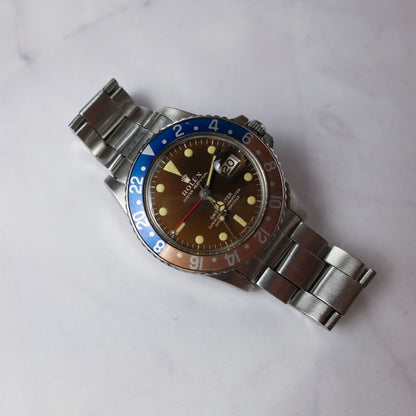 Rolex GMT-Master 1675 Glossy Gilt Tropical Dial Extremely Rare B+P 1966 (Full-Set/Serviced)